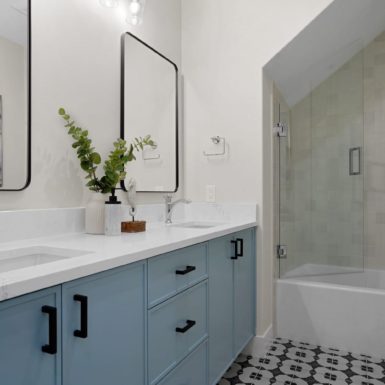 Bonus Room Bathroom Dark And White Tile Custom Cabinet White Countertop