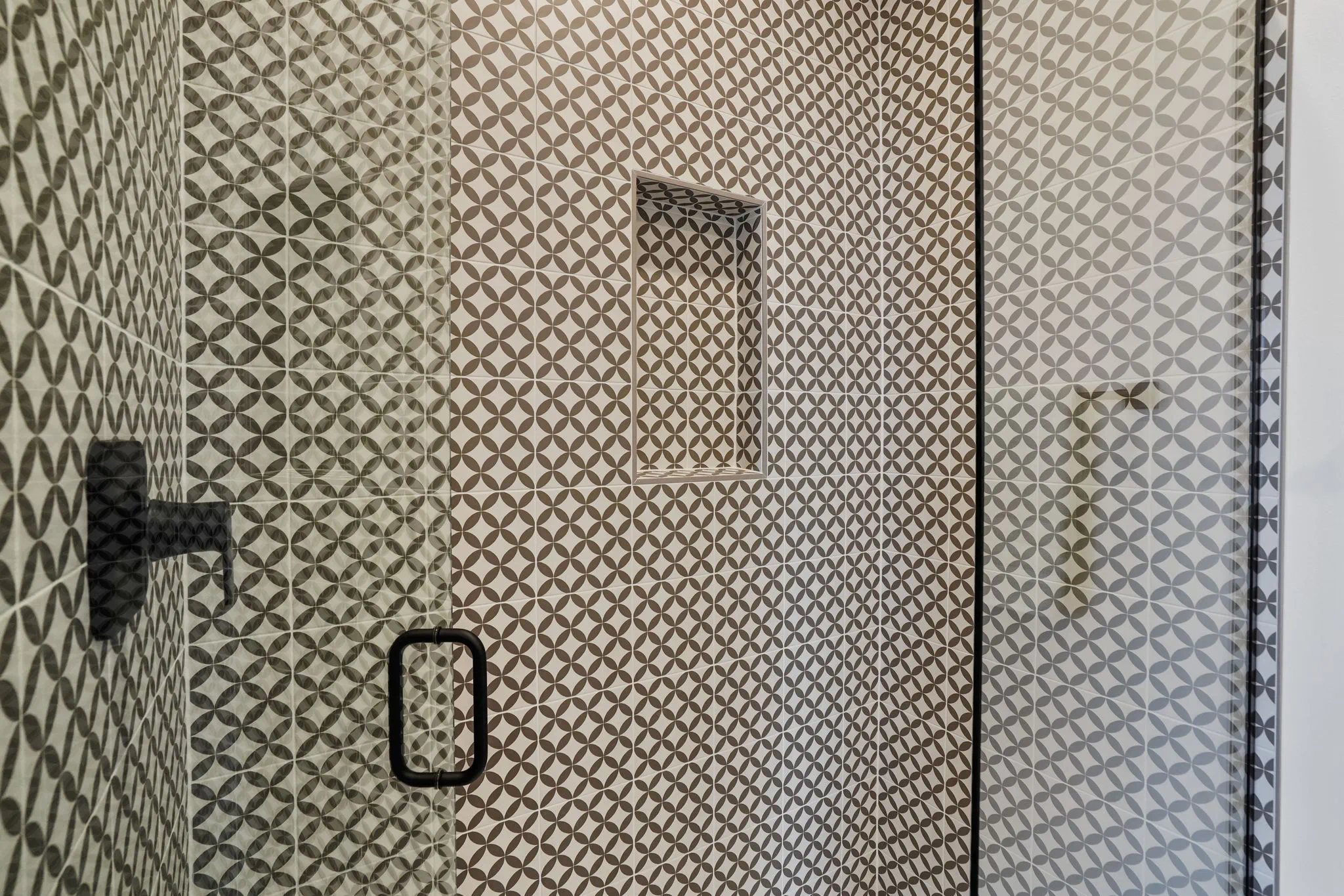 Bathroom Walk-in Shower Floor to Ceiling Geometric Tile Work