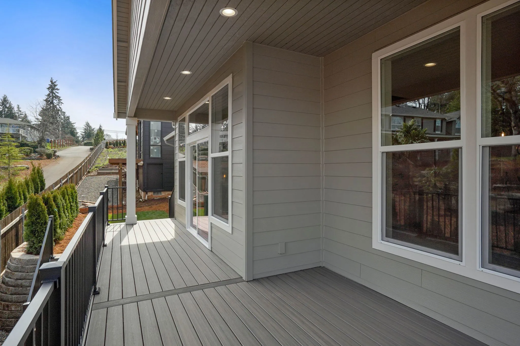 Exterior Deck With View To Two Level Backyard