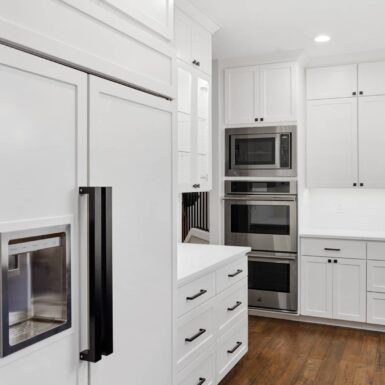 kitchen white fridge and white cabinets