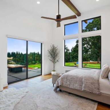 primary bedroom with large windows and tall ceilings 2023 Tour of Homes by Foksha Homes in Salem Oregon